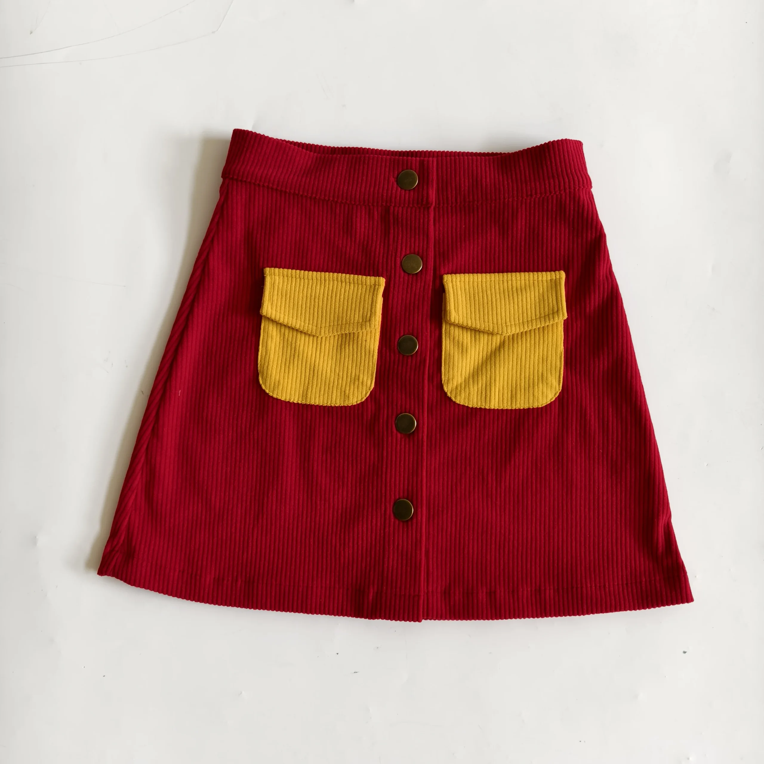 OEM Baby Clothing Girl Corduroy Skirts Kids Fall Winter Button Mini Skirt with Pockets - Image 2